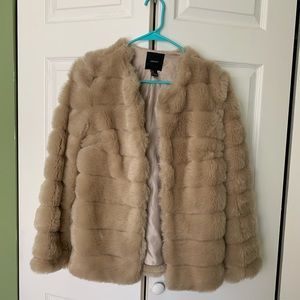 Beige faux fur coat